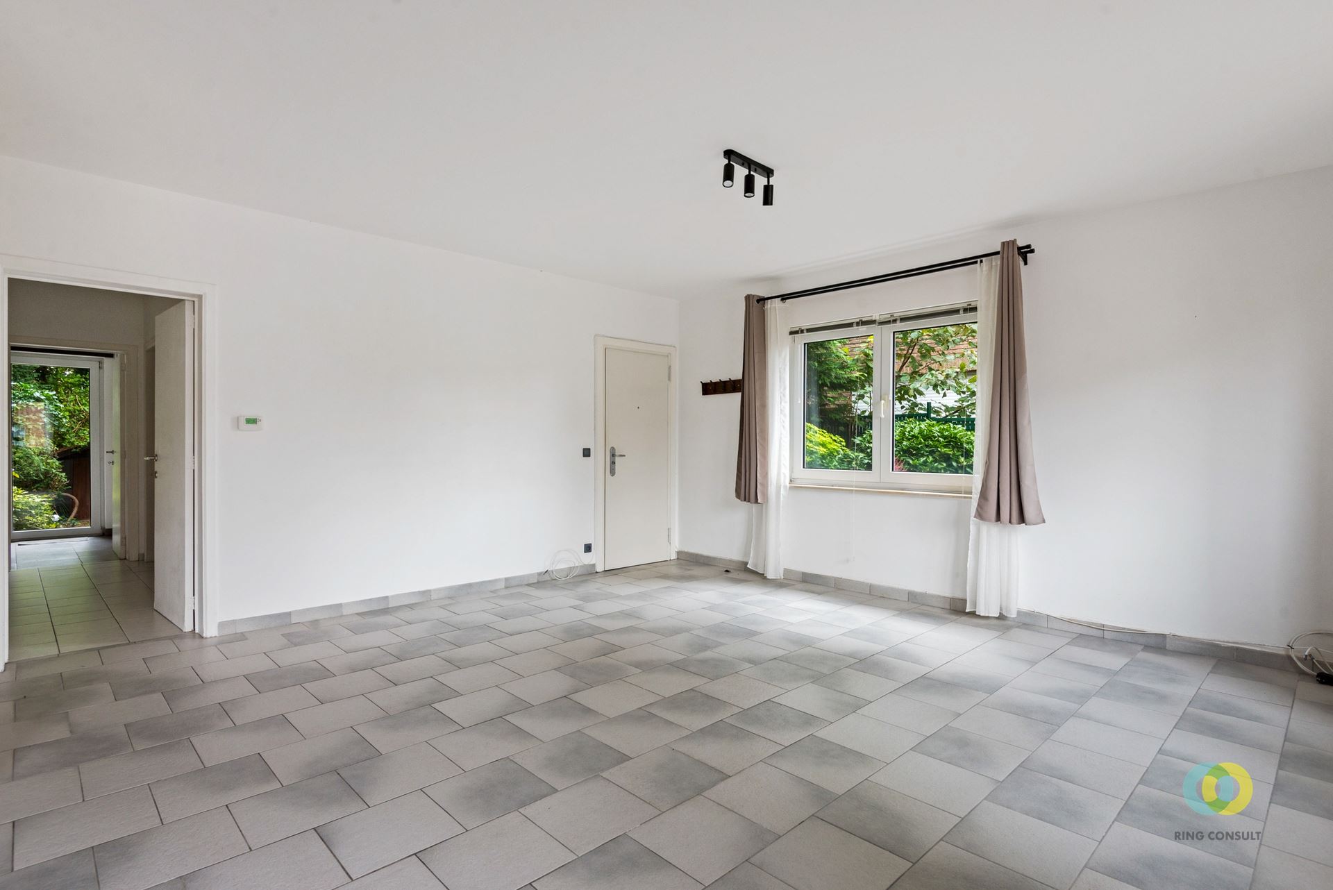 Gelijkvloersappartement met tuin en garage - foto 4