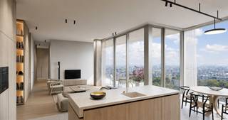 <p>Op de 26e verdieping van de iconische Antwerp Tower bevindt zich dit exclusieve Serenity-appartement van 146 m². De royale leefruimte en grote glaspartijen creëren een uitzonderlijke woonbeleving met indrukwekkende panoramische zichten over Antwerpen. Het appartement beschikt over 2 slaapkamers en 2 badkamers en combineert ruimte, privacy en een unieke ligging boven de stad.</p>
<p>Het appartement wordt momenteel onafgewerkt aangeboden. Voor meer informatie over de mogelijke afwerkingskeuzes en personalisatie kunt u contact opnemen met BROCOR.</p>
<p></p>