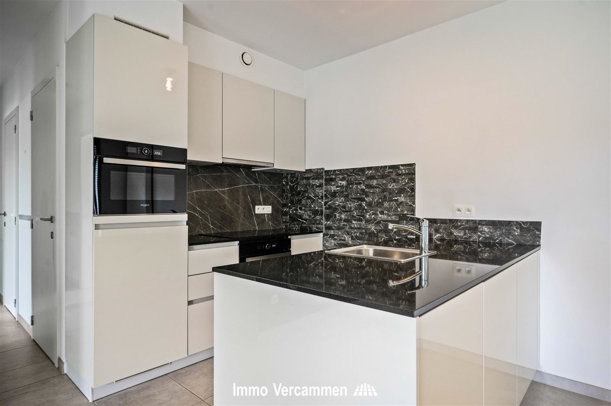 Gelijkvloers appartement met terras en autostaanplaats te Bonheiden - foto 4