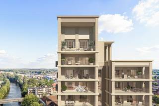 <strong>LANCERING NIEUWE FASE VAN LIV DE MOLENS</strong><br /><br />Dit comfortabele appartement van 103 m² op het zevende verdiep beschikt over een inkomhal met plaats voor een vestiairekast, een gastentoilet, een lichtrijke eet- en leefruimte, een open keuken, een praktische bergruimte, twee slaapkamers en een badkamer voorzien van een ligbad, een toilet en een dubbele wastafel. Daarnaast heeft het appartement ook een zuidoostelijk georiënteerd terras van 23 m² uitkijkend over de Leie en deels over de fraai aangelegde binnentuin. Het appartement is gelegen in de derde fase van Liv de Molens, een succesvol residentieel nieuwbouwproject langs de Leie in het hart van Deinze. De Noorse architect, Reiulf Ramstad, ontwierp een uitzonderlijk project met veel aandacht voor de zichten en lichten en dit langs het water, omringd door groen.<br /><br />Liv De Molens noemen we een ‘vijf-minutenstad’, waar alles wat u nodig heeft, op slechts vijf minuten wandelen ligt. De projectsite van maar liefst 2,2 hectare biedt een dynamische mix van wonen, handel, horeca, sport en recreatie en dit met een groene corridor als verbindende factor.<br /><br />Verlaagd BTW-tarief van 6% mogelijk op de volledige constructiewaarde, nu ook voor investeerders.<br /><br />Benieuwd naar het volledige aanbod in dit nieuwbouwproject, op een historische locatie in Deinze? Een persoonlijke, vrijblijvende afspraak kan via guillian@landbergh.be of 09 278 78 79