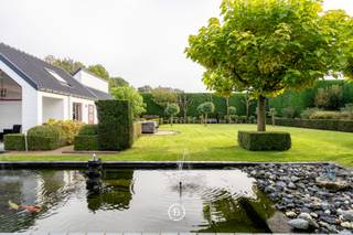 Between the charming town of Damme and historic Bruges lies this stunning 5.2-hectare estate, a unique oasis of tranquility and versatility. The elegant villa offers a generous and light-filled interior of 383 m², surrounded by a landscaped garden and pond of 2,117 m², with idyllic views over the polder.<br /><br />The property features three spacious outbuildings (one of 200 m² and two of 630 m²), ideal for self-employed professionals, storage or multifunctional use. In addition, the 2.5 hectares of arable land offer numerous possibilities, from agriculture to a horse pasture. Here, you can enjoy rural living while having the convenience of Bruges and Damme within easy reach.<br /><br />This estate is a rare find, an exceptional opportunity for anyone seeking a domain that offers possibilities as a family home, for commercial purposes, or as a hobby space. A place that combines authentic rural charm with a location on the border of Bruges and Damme.