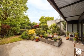 <p><span>Double house with lots of potential for sale in Kontich</span></p><p><span>in a quiet street at walking distance from the center of Boom we offer you this versatile double house. The property consists of two separate living units with separate house numbers: Gasstraat 14 and Gasstraat 12A. A unique opportunity for those looking for a kangaroo home, an investment with rental potential, or a combination of living and working. Or are you looking for a spacious home?</span></p><h3><span>Gas Street 14</span></h3><p><span>This home features a spacious and bright living space, a separate kitchen, a bathroom and two full-size bedrooms. Outside there is a cozy courtyard, perfect for enjoying the outdoors. Furthermore, there is also a basement, ideal as additional storage space.</span></p><p><span>Technically the property is in good order:</span></p><ul><li><span>Full double glazing with PVC windows</span></li><li><span>Heating with natural gas</span></li><li><span>EPC label C, indicating a good energy performance</span></li></ul><h3><span>Gas Street 12A</span></h3><p><span>This residential unit has a different construction and layout that make the property extra interesting:</span></p><ul><li><span>Ground floor: a very spacious garage, ideal for cars, storage or as work space</span></li><li><span>Second floor: here are the living space, a fitted kitchen and a bathroom</span></li><li><span>Attic: furnished as a bedroom with lots of natural light</span></li></ul><p><span> </span></p><p><span>This property is also double-glazed with the exception of one wooden Velux window in the attic. It boasts an EPC label D, providing a solid foundation with potential for improvement.</span></p><h3><span>Advantages of this property:</span></h3><ul><li><span>Two separate living units with their own house number and layout</span></li><li><span>Great for kangaroo living, double occupancy, practice space or as an investment</span></li><li><span>Central location in a quiet street in Boom, close to stores, schools and public transport</span></li><li><span>Fully double glazed windows in both properties (except for one Velux window)</span></li></ul><p><span> </span></p>