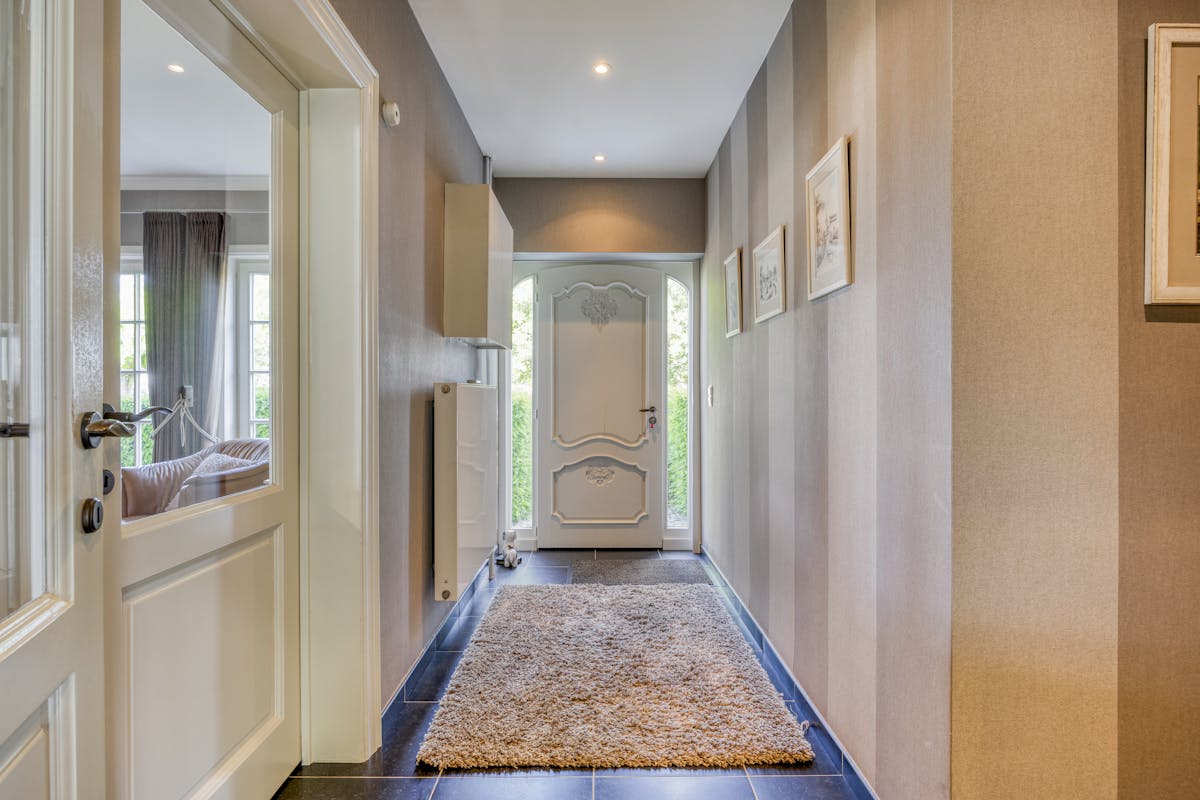 Riante zorgwoning/kangoeroewoning met loods te koop - foto 3