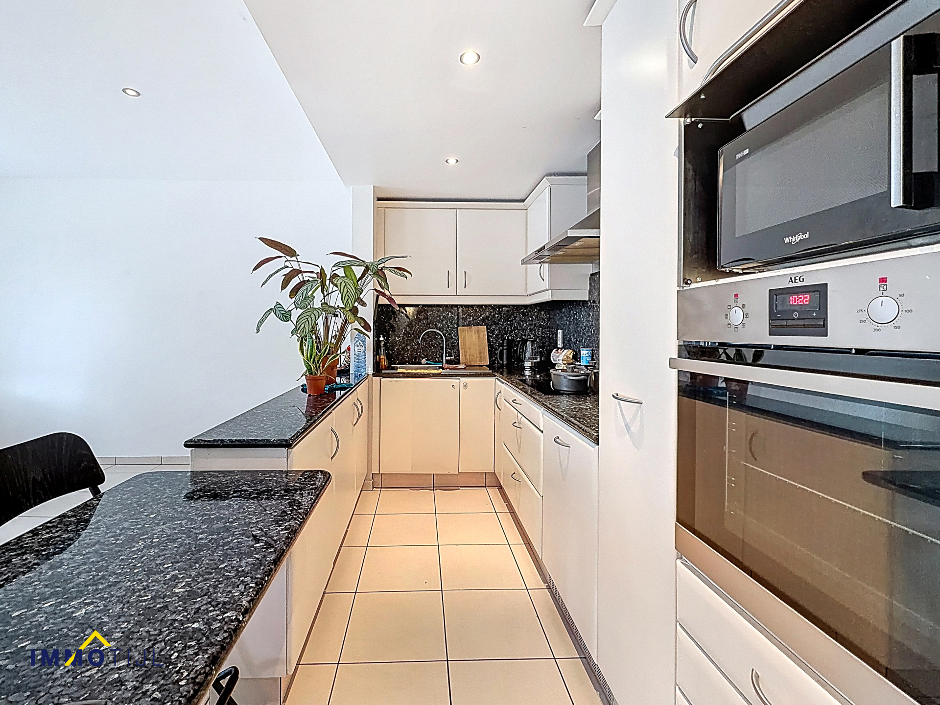 Verzorgd appartement met 2 slaapkamers en garage! - foto 5