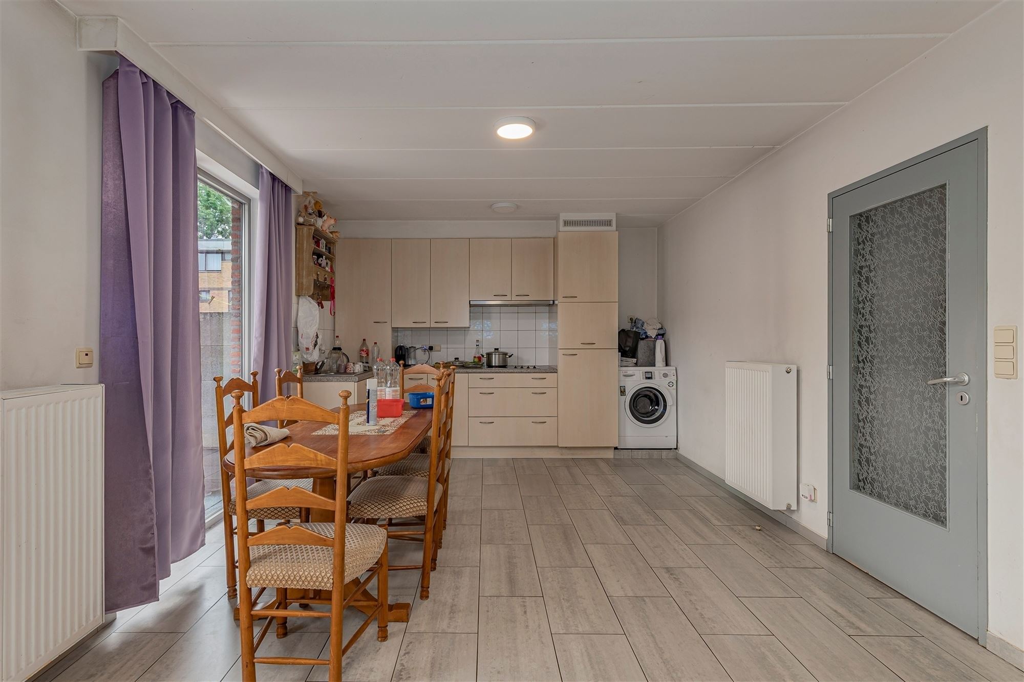 Lichtrijk 1-slaapkamer appartement met tuin en garagebox te koop in Merksem - foto 3