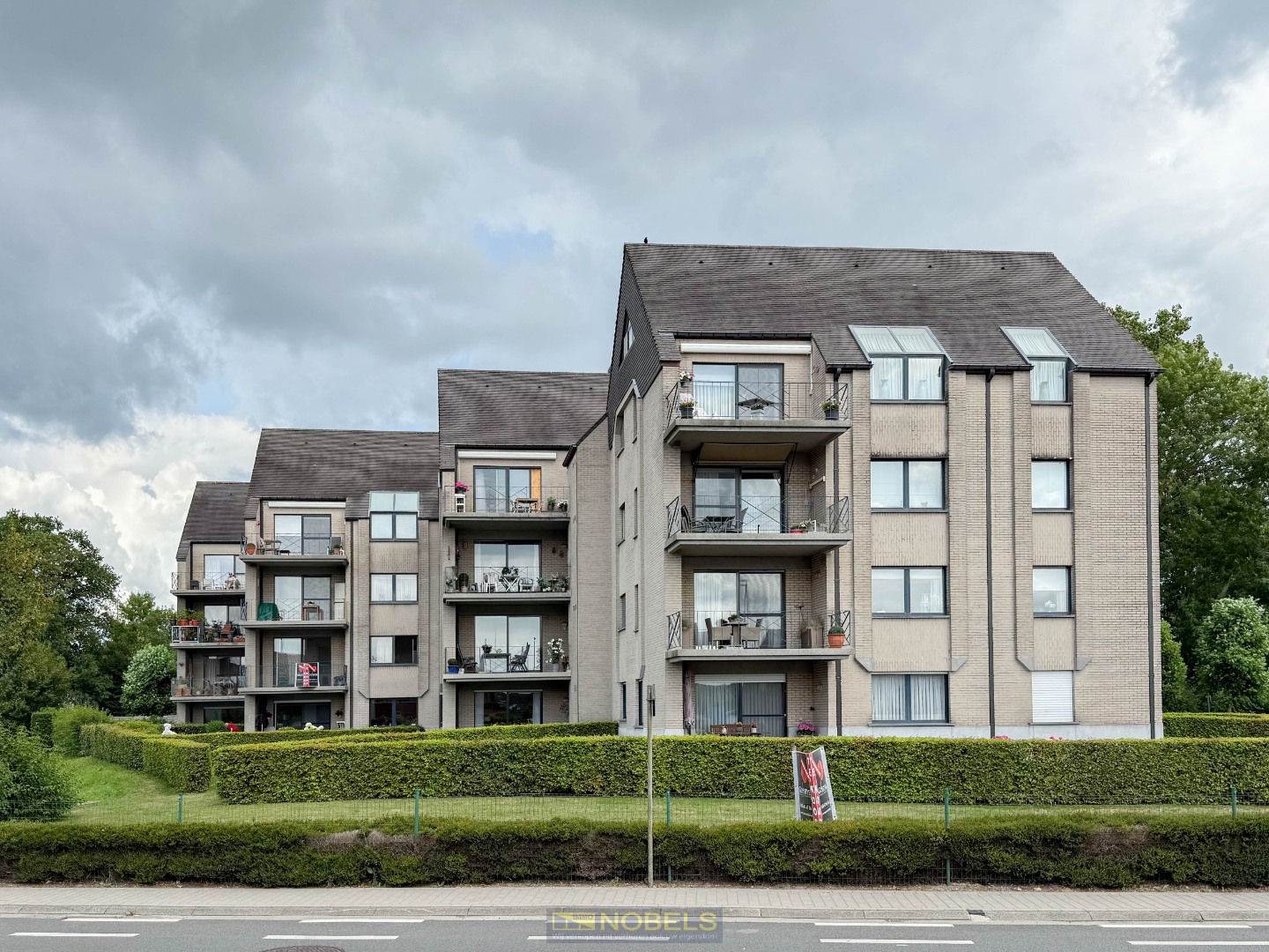 Te koop, zongericht gelijkvloers appartement met garage en tuin in Brakel - foto 1