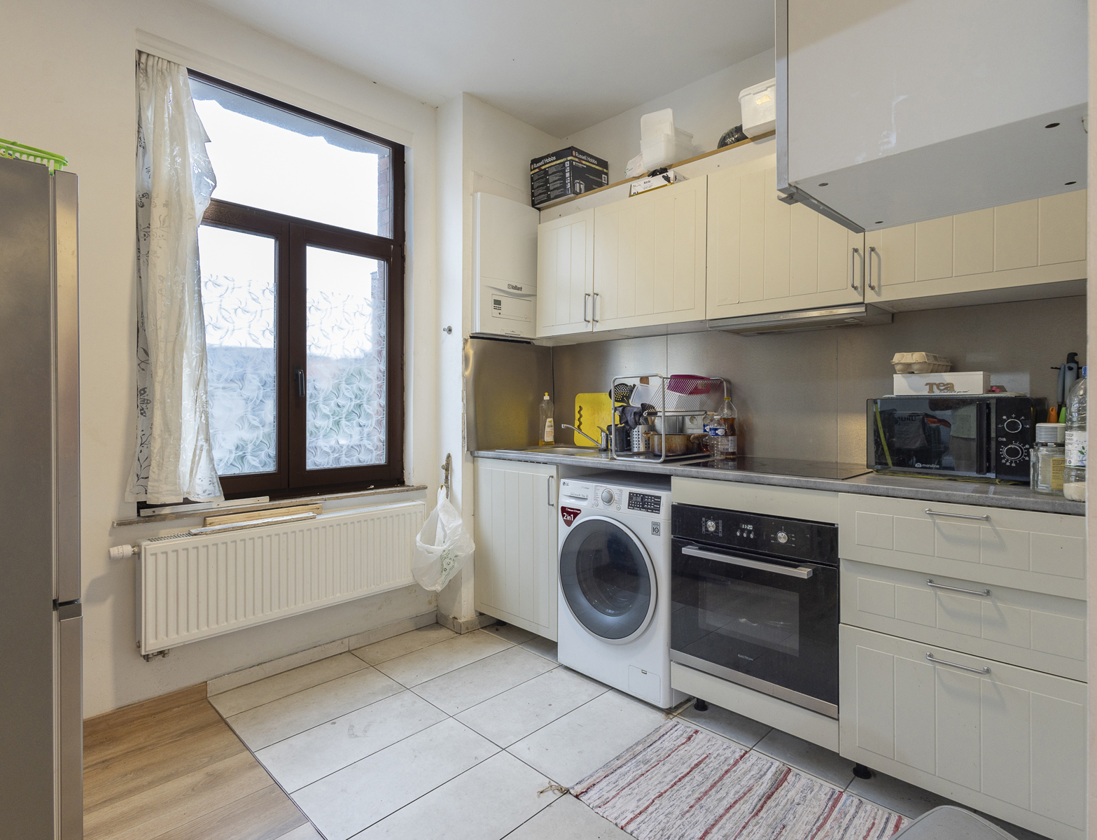 Gerenoveerd gebouw met handelsruimte + 2 appartementen - foto 5