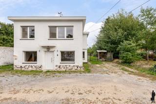 TE RENOVEREN WONING MET VEEL POTENTIEEL IN RUSTIGE BUURT TE SCHRIEK.Op een perceel van 1.175 m² vinden we deze vrijstaande woning met enorm veel...