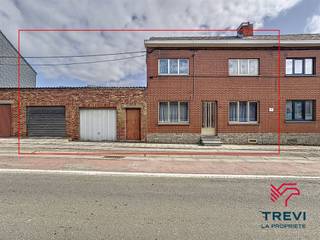 À vendre à Chapelle-lez-Herlaimont : maison à rénover avec trois garages, idéale pour un projet d’investissement ou une habitation à...