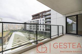 1140 EVERE (36 Jules Bordet Ave.) - Located just outside Brussels, in a new residential complex, this beautiful, warm, and bright apartment will...