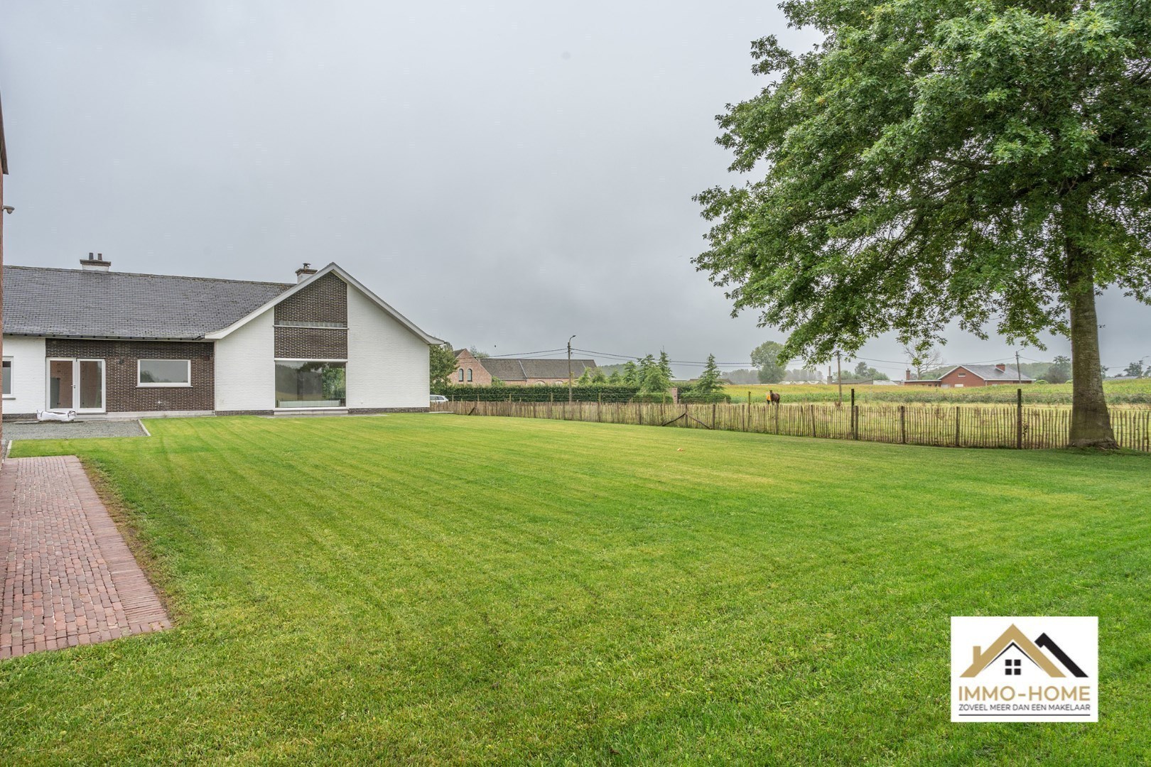 Ruime woning met magazijn en open zicht op topligging - foto 3