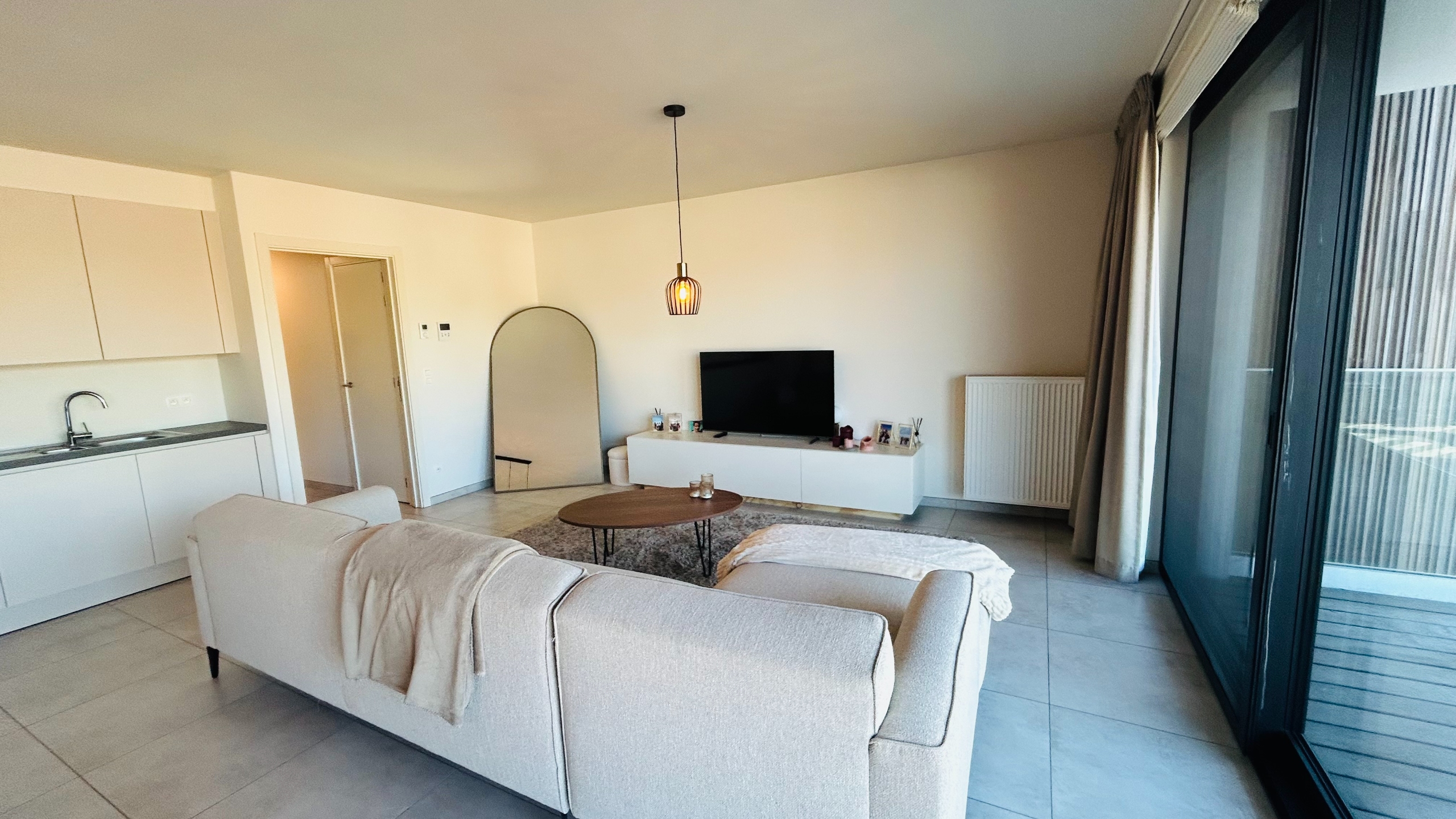 Ruim en verzorgd appartement met terras en autostaanplaats in residentie De Beuk - foto 3