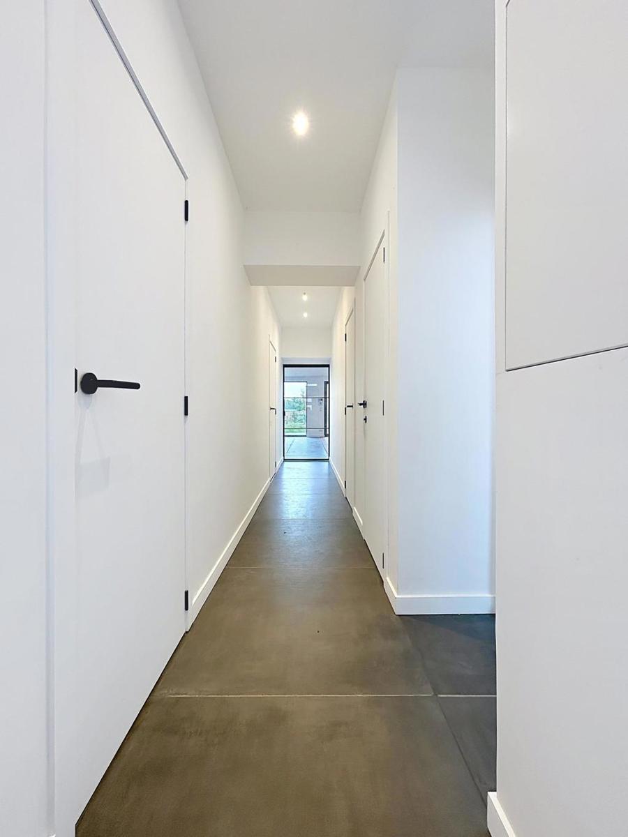 Woning op 592 m² met 3 slaapkamers en grote tuin met uitweg - foto 4