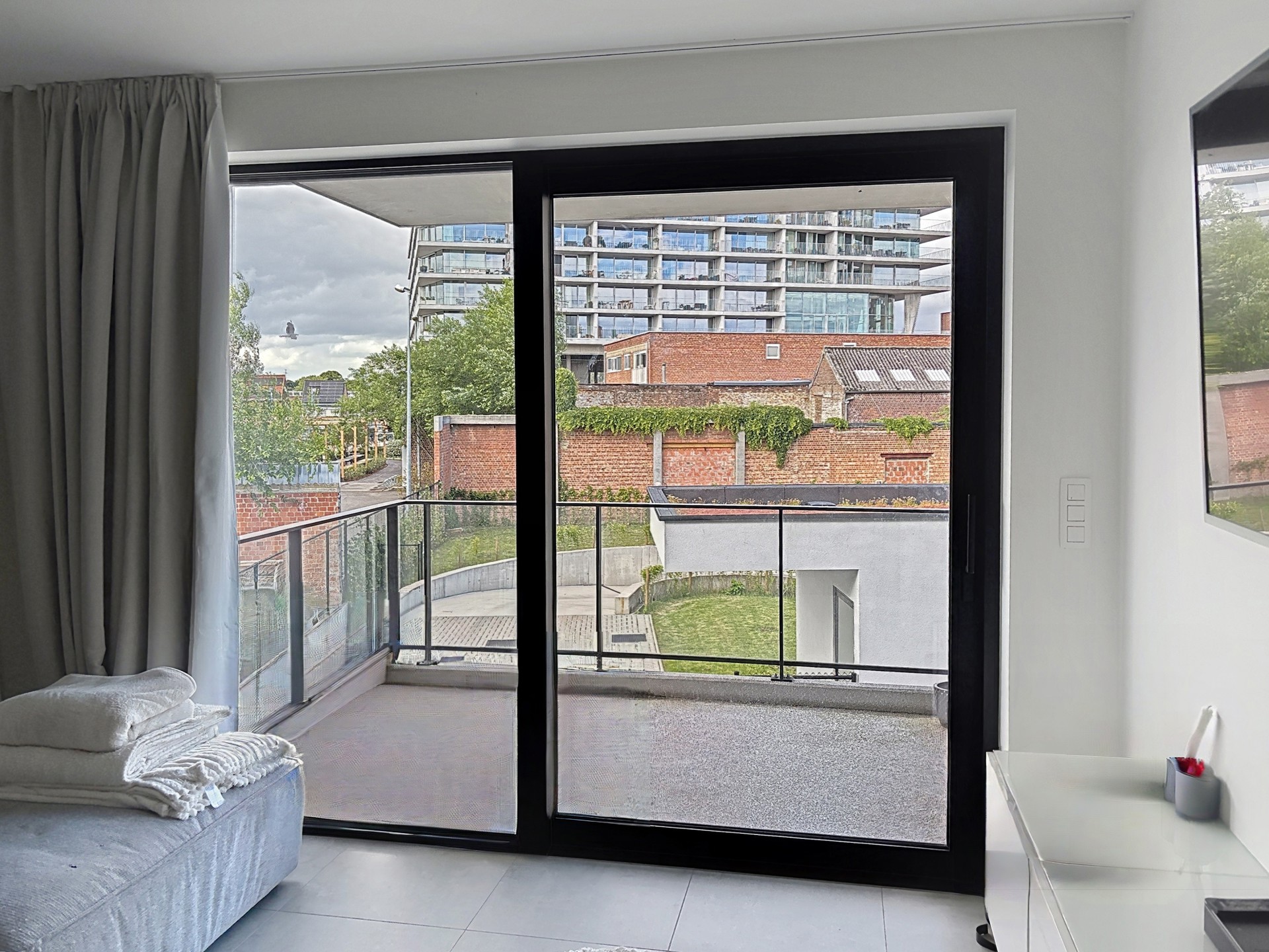 Nieuwbouw appartement met staanplaats in centrum Merchtem - foto 4