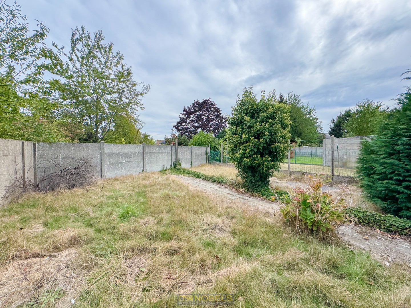 Te koop, te renoveren halfopen bebouwing met garage en tuin te Merelbeke! - foto 3