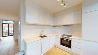 This recent apartment of about 90 ² is located near the MAS, within walking distance of the Eilandje and the historic center. <br /><br />Layout: through the spacious entrance hall you enter the living room on parquet flooring. Dining room, living room and the fully equipped kitchen flow seamlessly into each other, so you are always in connection with your guests. Thanks to the beautiful facade width, you enjoy an abundance of light. <br /><br />Through the night hall access to a quiet and spacious master bedroom, spacious second bedroom. Bathroom equipped with a shower in sink. Separate storage room for washer/dryer and separate toilet.<br /><br />This is a spacious apartment in a super central location.<br /><br />Details:<br />- Recently renovated<br />- prime location <br />- Common costs 50 EUR / month