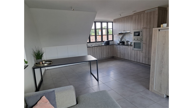 Een gunstig gelegen en mooi afgewerkt appartement - foto 4