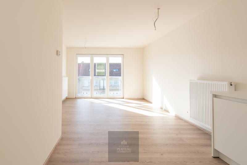Appartement récent avec une chambre, place de parking et cave. - photo 4