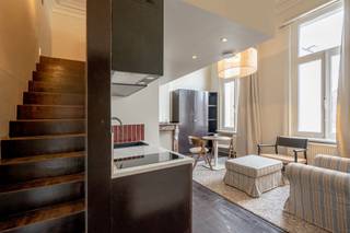 <p><span>Stijlvolle studio in co-living concept in hartje Antwerpen </span></p><p><span> </span></p><p><span>Deze studio (eerste verdieping) maakt deel uit van "Old Brick", een prachtig gerenoveerd gebouw van meer dan 600 m², gelegen aan de Oudesteenweg 108 in een rustige buurt, vlakbij winkels, openbaar vervoer en het Centraal Station van Antwerpen.</span></p><p><span> </span></p><p><span>De studio beschikt over een eigen bed, badkamer met douche en toilet en kitchenette, wat zorgt voor comfort en privacy. </span></p><p><span>Daarnaast hebben bewoners toegang tot kwalitatieve gemeenschappelijke ruimtes, waaronder een volledig uitgeruste keuken, ruime leefruimte, eetplaats, werkplekken en een gezellige lounge, ontworpen om verbinding en welzijn te stimuleren. </span></p><p><span> </span></p><p><span>Old Brick huisvest een dynamische community van voornamelijk internationale expats en young professionals die waarde hechten aan comfort, design en samenleven. </span></p><p><span> </span></p><p><span>Bijzonderheden:</span><span> </span></p><p><span>- De huurprijs is inclusief elektriciteit, water, gas, internet, wekelijkse cleaning van de gemeenschappelijke ruimtes, meubilair, Netflix en community events. </span></p><p><span>- Beschikbaar vanaf 1 mei 2026</span></p><p><span> </span></p><p><span>De foto's vanaf de draaitrap zijn van de gemeenschappelijke delen. </span></p><p><span> </span></p><p><span>Ben jij geïnteresseerd in gemeubelde kamers te huur in Antwerpen centrum, ben je op zoek naar ander vastgoed of wens je de waarde van jouw eigendom te kennen? Dan ben je bij BOLT Immo aan het juiste adres! Wij helpen jou graag verder.</span></p><p><span> </span></p><p><span>__________________________________________________________________________</span></p><p><span> </span></p><p><span>Stylish private studio in a co-living concept in the heart of Antwerp</span></p><p><span> </span></p><p><span>This studio (first floor) is part of “Old Brick” a beautifully renovated building of over 600 m², located at Oudesteenweg 108 in a quiet neighborhood, close to shops, public transport, and Antwerp Central Station.</span></p><p><span> </span></p><p><span>The studio features a private bed, bathroom with shower and toilet, and kitchenette, ensuring comfort and privacy.</span></p><p><span>In addition, residents have access to high-quality shared spaces, including a fully equipped kitchen, spacious living area, dining space, workspaces, and a cozy lounge, all designed to foster connection and well-being.</span></p><p><span> </span></p><p><span>Old Brick is home to a dynamic community of mainly international expats and young professionals who value comfort, design, and community living.</span></p><p><span> </span></p><p><span>Key features:</span></p><ul><li><span>The rental price includes electricity, water, gas, internet, weekly cleaning of the common areas, furniture, Netflix, and community events </span></li><li><span>Available from May 1st</span></li></ul><p><span> </span></p><p><span>The photos from the spiral staircase onwards show the common areas. </span></p><p><span> </span></p><p><span>Are you interested in this studio for rent in Antwerp, are you looking for other real estate or would you like to know the value of your property? Then you have come to the right place at BOLT Immo! We will gladly help you.</span></p><p><span> </span></p><p><span> </span></p><p><span> </span></p><p><span> </span></p><p><span> </span></p><p><span> </span></p>