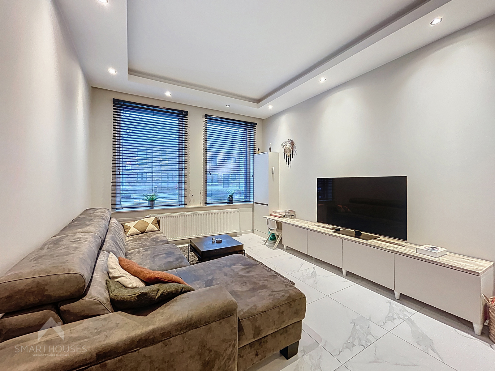 Volledig afgewerkte woning met 4 slaapkamers en grote tuin. - foto 4