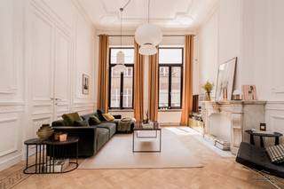BEN JE OP ZOEK NAAR EEN STIJLVOL EN INSTAPKLAAR GELIJKVLOERS APPARTEMENT MET TUIN TE KOOP IN ANTWERPEN? ONTDEK DIT UNIEKE APPARTEMENT VAN CA. 105...
