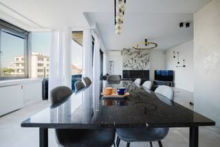 Location<br /><br />Centrally located within walking distance of the Blaarmeersen and Coupure and within cycling distance of the city centre. Easy access to public transport and the R4/E17/E40 motorways.<br /><br />Layout<br /><br />The flat is located on the 3rd floor and comprises: a spacious entrance hall, a guest toilet, a bright living room with dining area and open fully equipped kitchen with access to the terrace, a laundry room with walk-in shower, the first bedroom with terrace, a bathroom with walk-in shower and double sink, an extra storage room, the second bedroom with double bed and third bedroom. Each room is heated and cooled with a heat pump. This flat comes with the option to purchase a parking space, which is a definite bonus for everyday convenience.<br /><br />Advantages<br /><br />- Ready to move in<br />- Energy efficient<br />- Spacious<br />- Location<br /><br />For more information or to make an appointment, please contact Andreas on 0472/61.00.00.