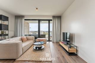 Voor meer info en foto’s, surf naar www.swevers.be– Ontdek dit stijlvolle en instapklare appartement van 72 m² op de zesde verdieping van de moderne...