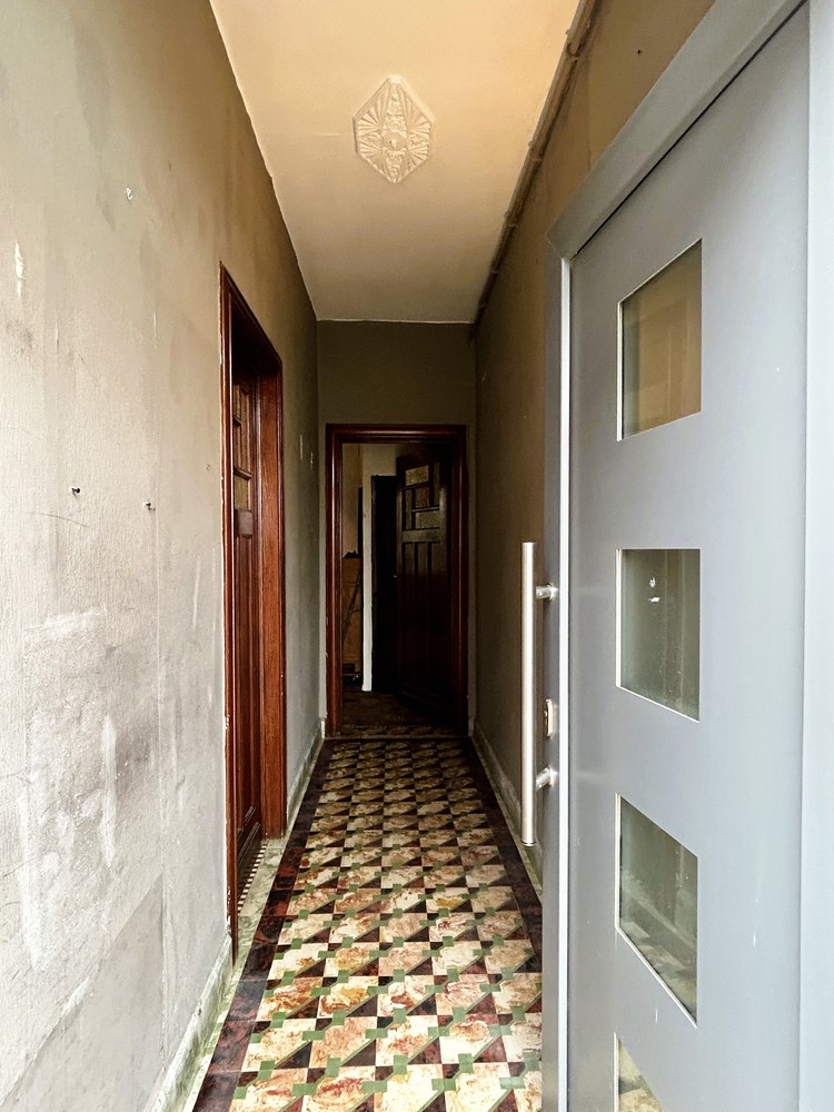 Te renoveren halfopen bebouwing met tuin - groot potentieel - foto 3