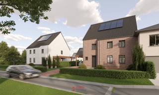 Cette maison est une maison jumelée qui se distingue par ses beaux volumes intérieurs et son jardin spacieux, offrant un cadre de vie confortable et agréable. Elle présente un équilibre harmonieux entre espace, intimité et fonctionnalité.<br /><br />Les espaces de vie sont généreux et bénéficient d’une belle luminosité, créant une atmosphère contemporaine et conviviale. Le jardin offre de nombreuses possibilités d’aménagement pour la détente, les jeux ou la verdure.<br /><br />Cette habitation est conçue selon les principes de l’habitat moderne et économe en énergie, intégrant des techniques contemporaines et une attention particulière portée au confort.<br /><br />La construction n’ayant pas encore débuté, l’acquéreur bénéficie d’une large liberté de choix en matière de matériaux et de finitions, permettant une personnalisation complète.<br /><br />Enfin, cette maison peut être acquise au taux réduit de 6 % de TVA (sous conditions), représentant un avantage financier significatif.