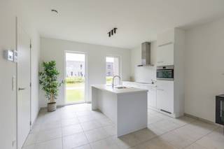 On Sint-Truidersteenweg 419A in Sint-Lambrechts-Herk, we find this energy-efficient new-build home with a habitable surface of 169 m². On the ground floor, we enter through the entrance hall, which provides access to the separate toilet and kitchen. The kitchen is adjacent to the living room where the large windows provide a lot of light. The sliding windows give access to the terrace and garden where you can relax in the sun. There is also a storage room on the ground floor.<br />On the first floor, there are three spacious bedrooms, storage room and bathroom (double sink, bath and shower).<br /><br />The underground car park has a parking space (mandatory to purchase) and private basement storage (optional). There is also a communal bicycle shed.<br /><br />Advantages:<br />- BEN home<br />- Latest techniques<br />- Spacious and bright home<br />- Practical layout<br />- Car-free zone<br /><br />Relevant documents are also available on our website www.dewaele.com