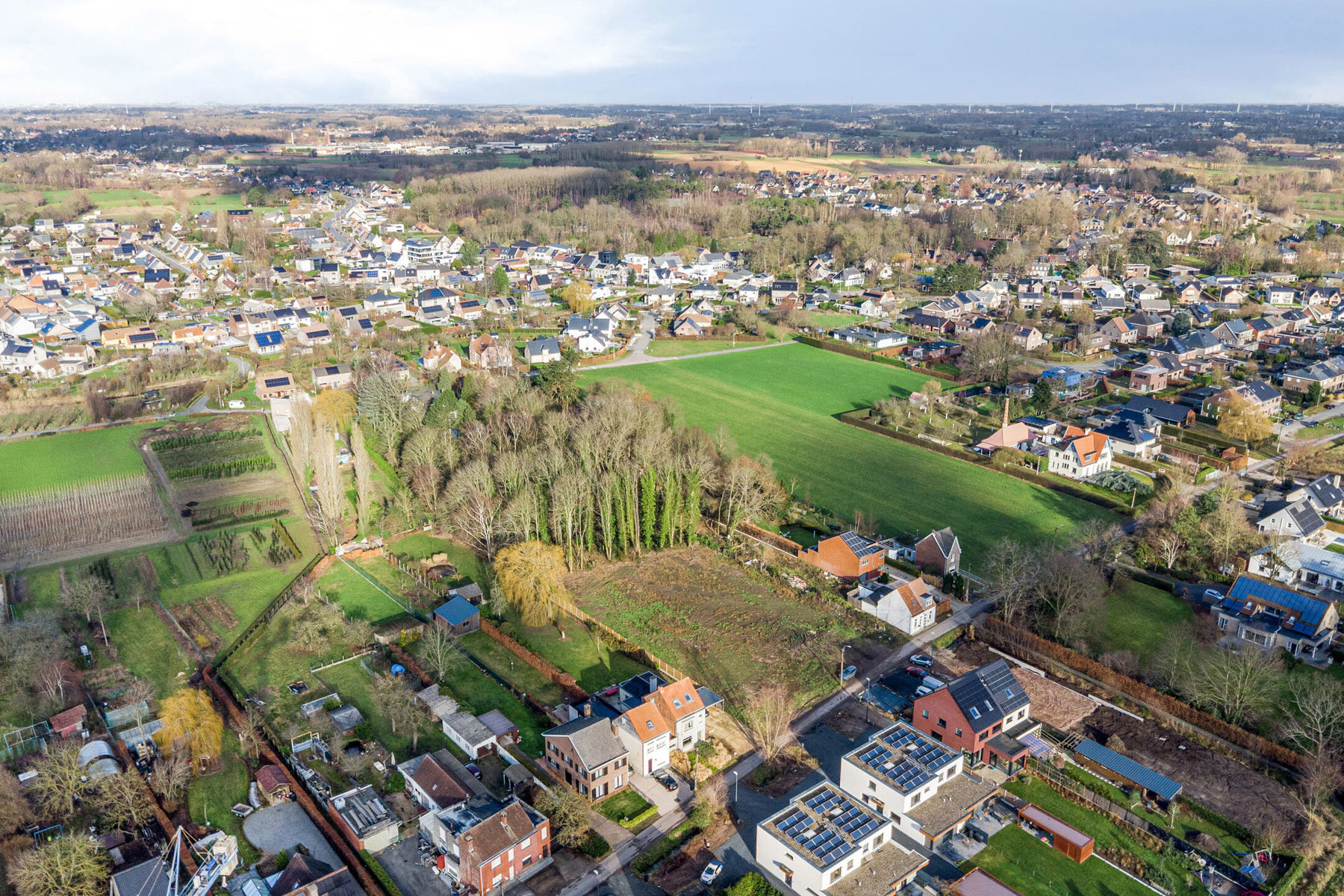 TE KOOP - bouwgrond halfopen bebouwing met stuk bos op 1276m² - foto 2