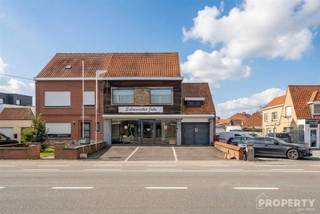 This versatile commercial property with residential offers an excellent opportunity for those who want to combine living and working in a visible and easily accessible location.Location:Located along the Brugsesteenweg, this property enjoys excellent visibility and a smooth connection to surrounding municipalities and major approach roads. Thanks to its central location, stores, schools and public transport are in the vicinity.Layout:On the ground floor there is the commercial property with an adjoining practical basement area and a private garage. There are also several parking spaces in front of the building, which provides additional comfort for customers.The first floor apartment comprises a spacious and bright living area with open kitchen, which opens onto a pleasant and spacious terrace. Furthermore, the apartment has two full bedrooms, a bathroom with shower and a spacious attic space that offers numerous possibilities.For more information or a visit call 056 96 08 00 or email info@property-vastgoed.be