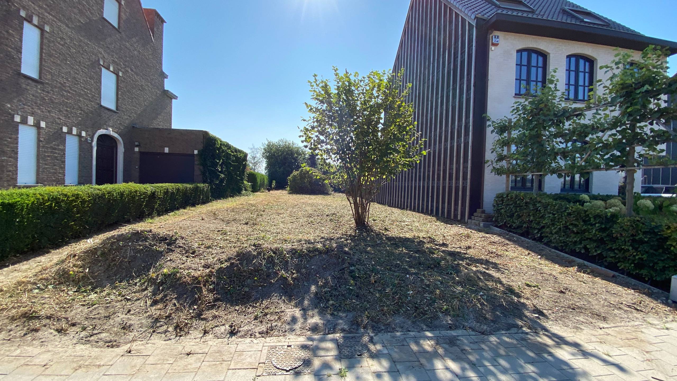 Unieke zuid-bouwgrond (485 m²) voor ruime half-open woning - foto 4