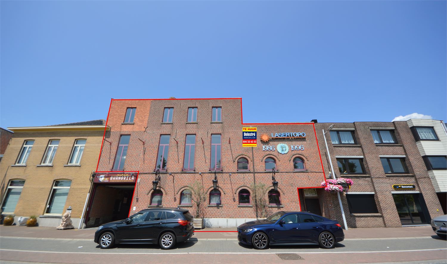 Uniek commercieel gebouw te huur in hartje Herzele – voormalig brouwerijpand met karakter en ruimte - foto 1