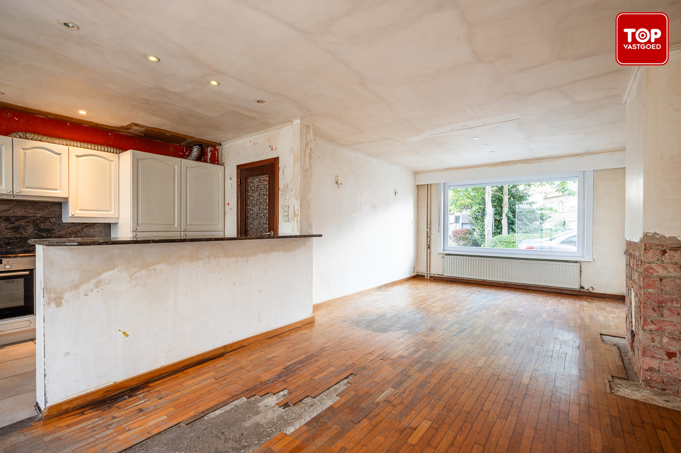 Te renoveren half open woning met tuin en garage. - foto 5