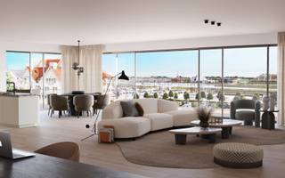 Dit appartement maakt deel uit van het nieuwbouwproject 'Residentie One Harbour'.<br /><br />Het appartement bevindt zich op de eerste verdieping en werd ingedeeld als volgt:<br />Inkom, toilet, berging, keuken, leefruimte met aanpalend terras, 2 slaapkamers, badkamer en bureauruimte. <br />Het terras is zuidwestelijk georiënteerd. <br /><br />Verplicht aan te kopen garagebox of staanplaats niet in de prijs inbegrepen. <br /><br />Appartement: 118 m²<br />Terras: 27 m²