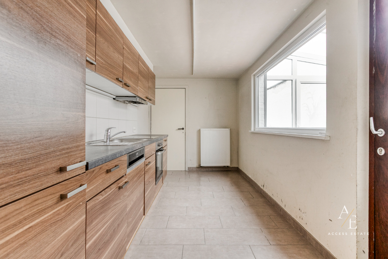 CENTRAAL GELEGEN WONING MET 3 (+2) SLAAPKAMERS EN AFGESLOTEN TUIN IN WEVELGEM - foto 5