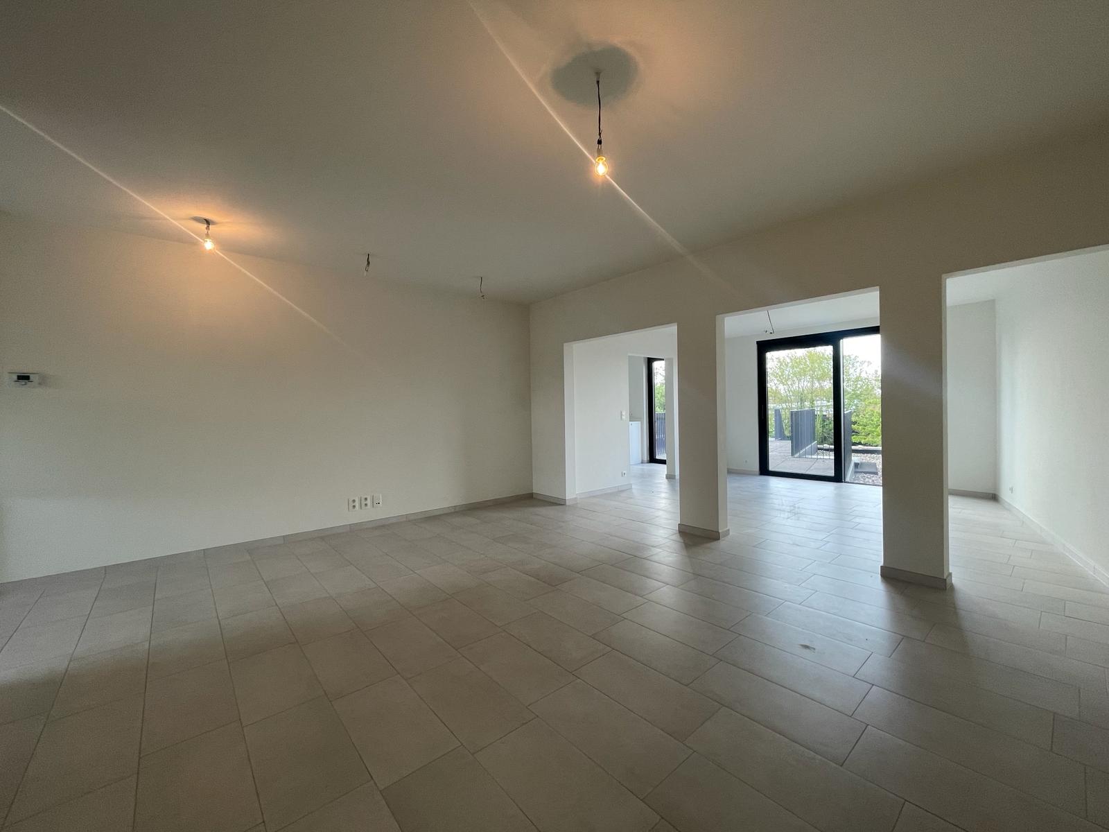 Duplex app met 3 slpks en tuin - foto 4