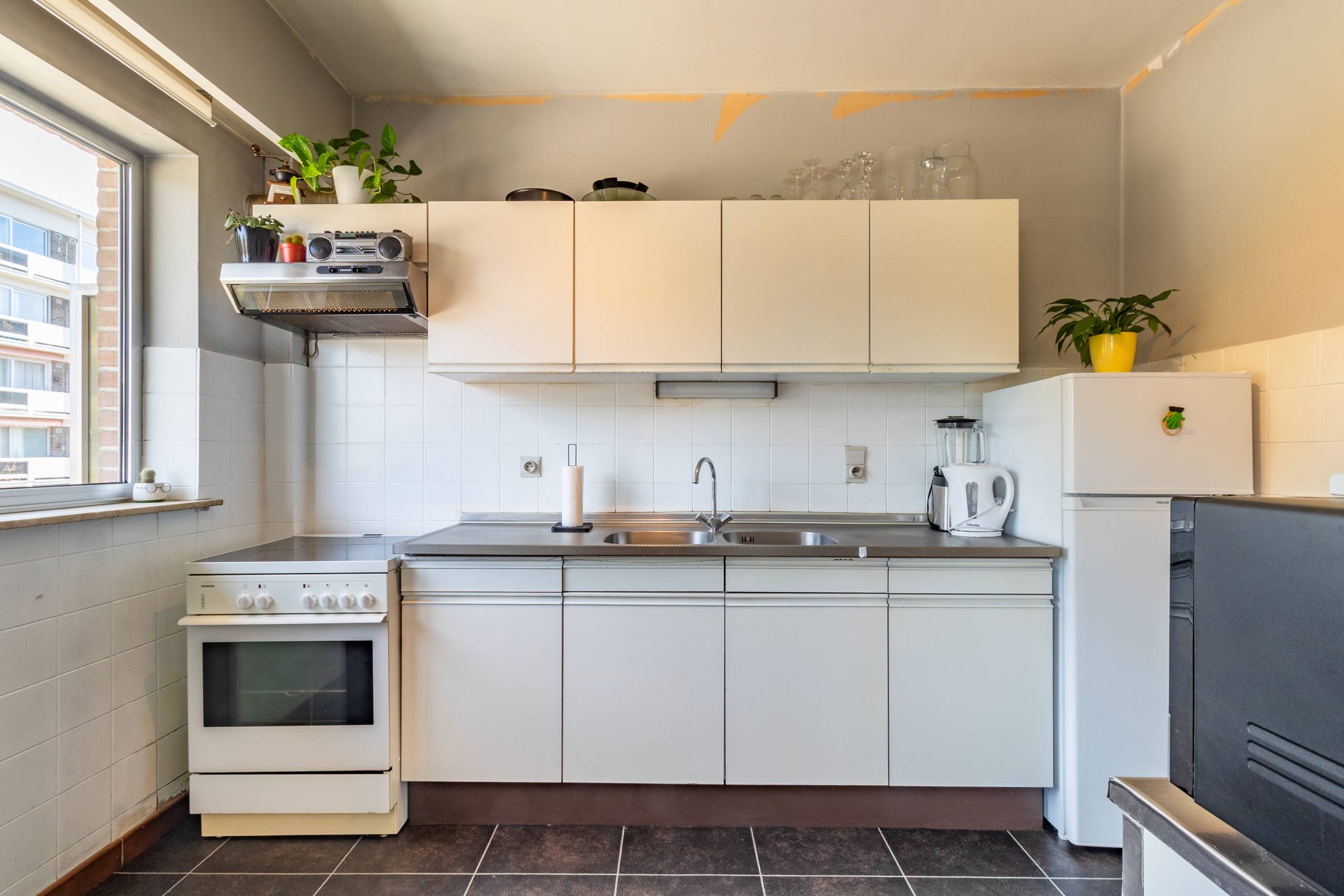 Praktisch appartement met garagebox en twee terrassen - foto 5