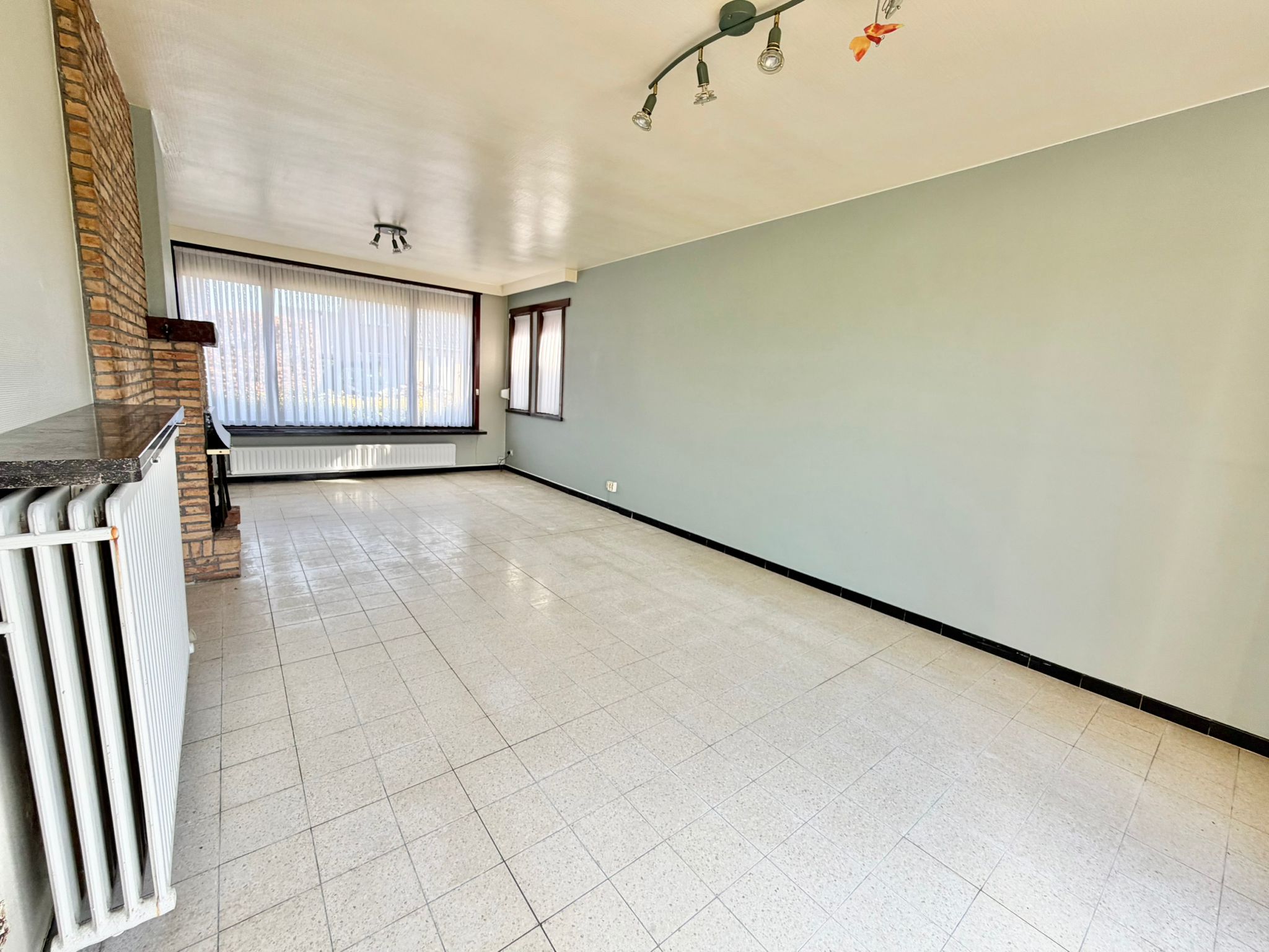 Ruime halfopen woning te renoveren in een rustige buurt. - foto 4