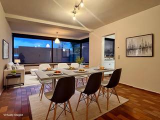 Bij het binnentreden van het appartement komt u binnen in de ruime leefruimte die in verbinding staat met een aangenaam, ruim terras. De...