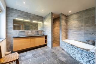 Gelegen in het hart van de Coteaux-wijngaard in Villers-la-Ville maakt deze kamer van 40 m² op het gelijkvloers deel uit van een...