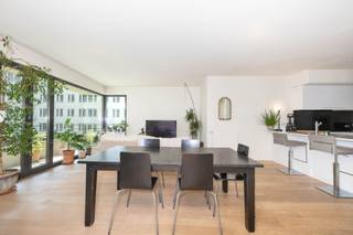 <strong>BRUSSELS</strong>, in the exceptional “UPSITE” development, opposite Tour & Taxis – a stunning flat of ±119m² on the 3rd floor of the apartment block. It comprises: entrance hall, living room of ±32m² with a terrace of ±14m², fully fitted kitchen, 3 bedrooms, bathroom, shower room, cellar (U02-CV45). Parquet flooring throughout. Service charges: €290/month (communal charges, insurance, property management). Available immediately. Energy performance certificate: B. A rare find in a rapidly developing neighbourhood, set amongst the canal, green spaces, a food market and excellent transport links. <br /><br />
<ul>
<li>Entrance hall – cloakroom – toilet with washbasin</li>
<li>Spacious living room of ±32m² with access to the terrace of ±14m²</li>
<li>Fully fitted Siemens kitchen (oven, hobs, extractor hood, fridge, freezer, dishwasher, microwave, laundry connections)</li>
<li>1 bedroom of ±15.5m² + en-suite bathroom (bath, washbasin, toilet)</li>
<li>1 bedroom of ±10m²</li>
<li>1 bedroom of ±9m²</li>
<li>Shower room (shower, washbasin)</li>
<li>Cellar U02-CV45</li>
</ul>