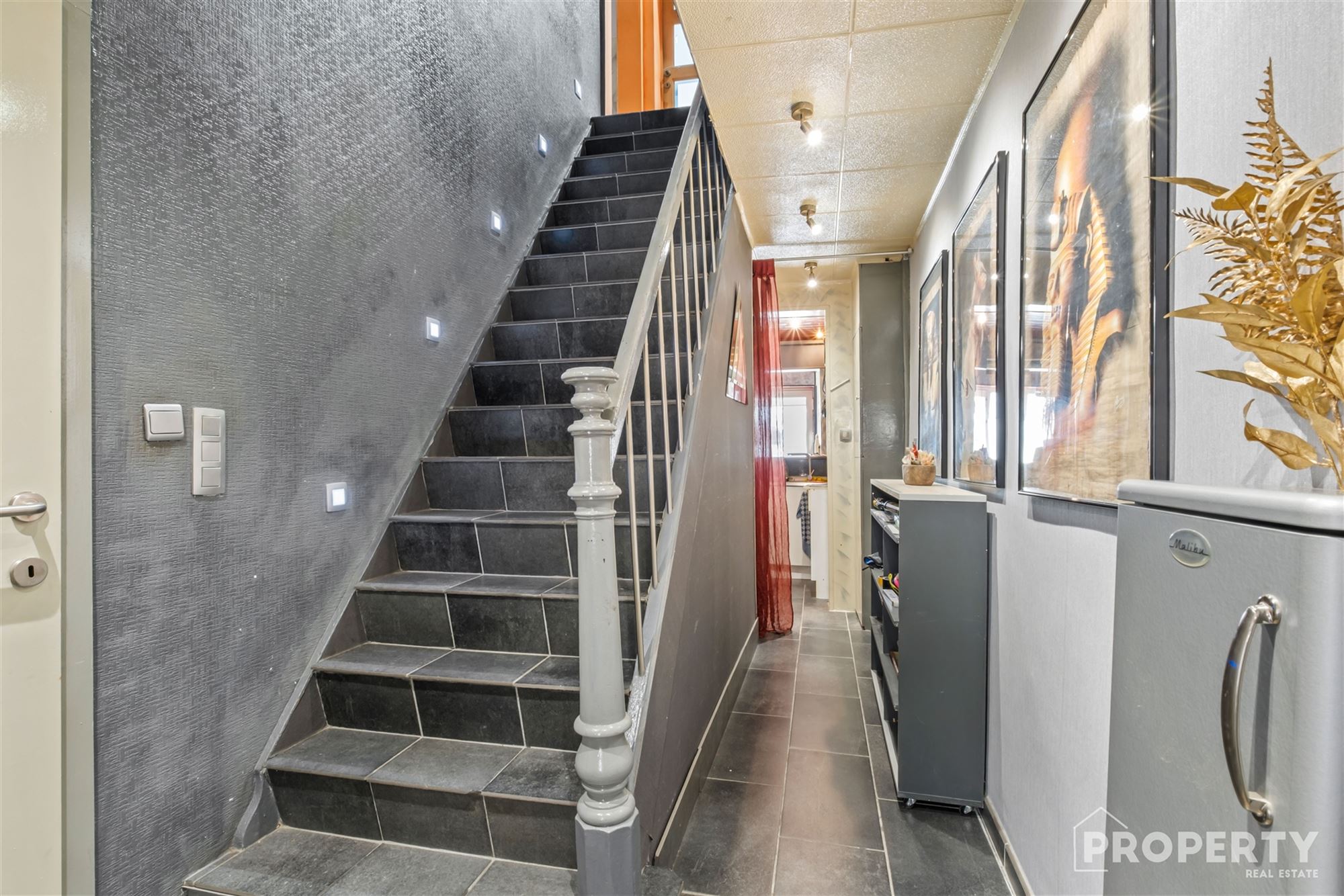 Grote woning met handelsruimte pal in het centrum! - foto 5