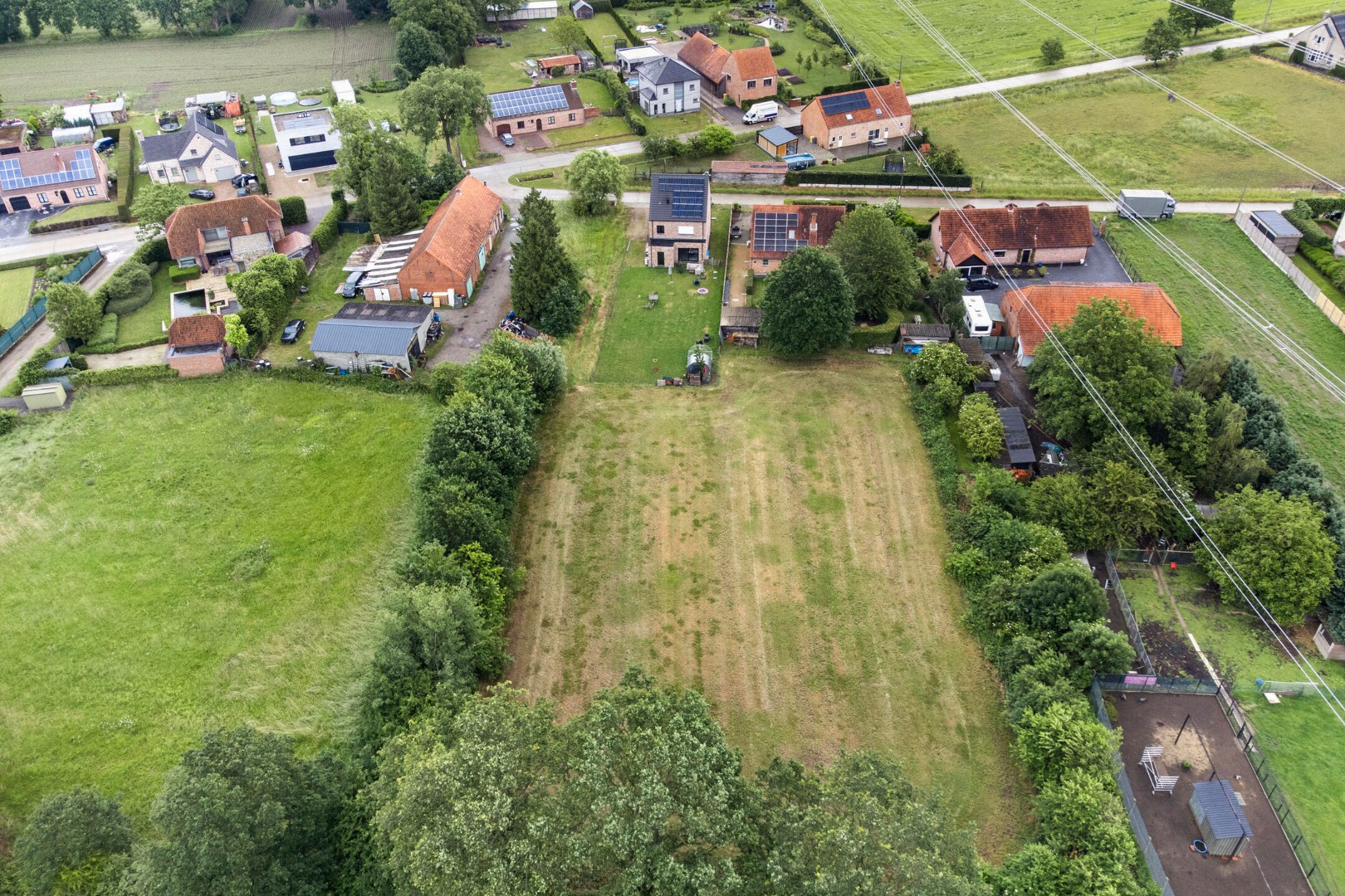 Bouwgrond voor open bebouwing met achterliggend weiland op 4.581 m² in Olmen - foto 4