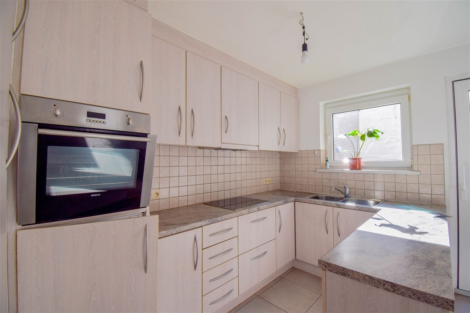 Instapklaar gelijkvloers appartement met ruim terras - foto 4