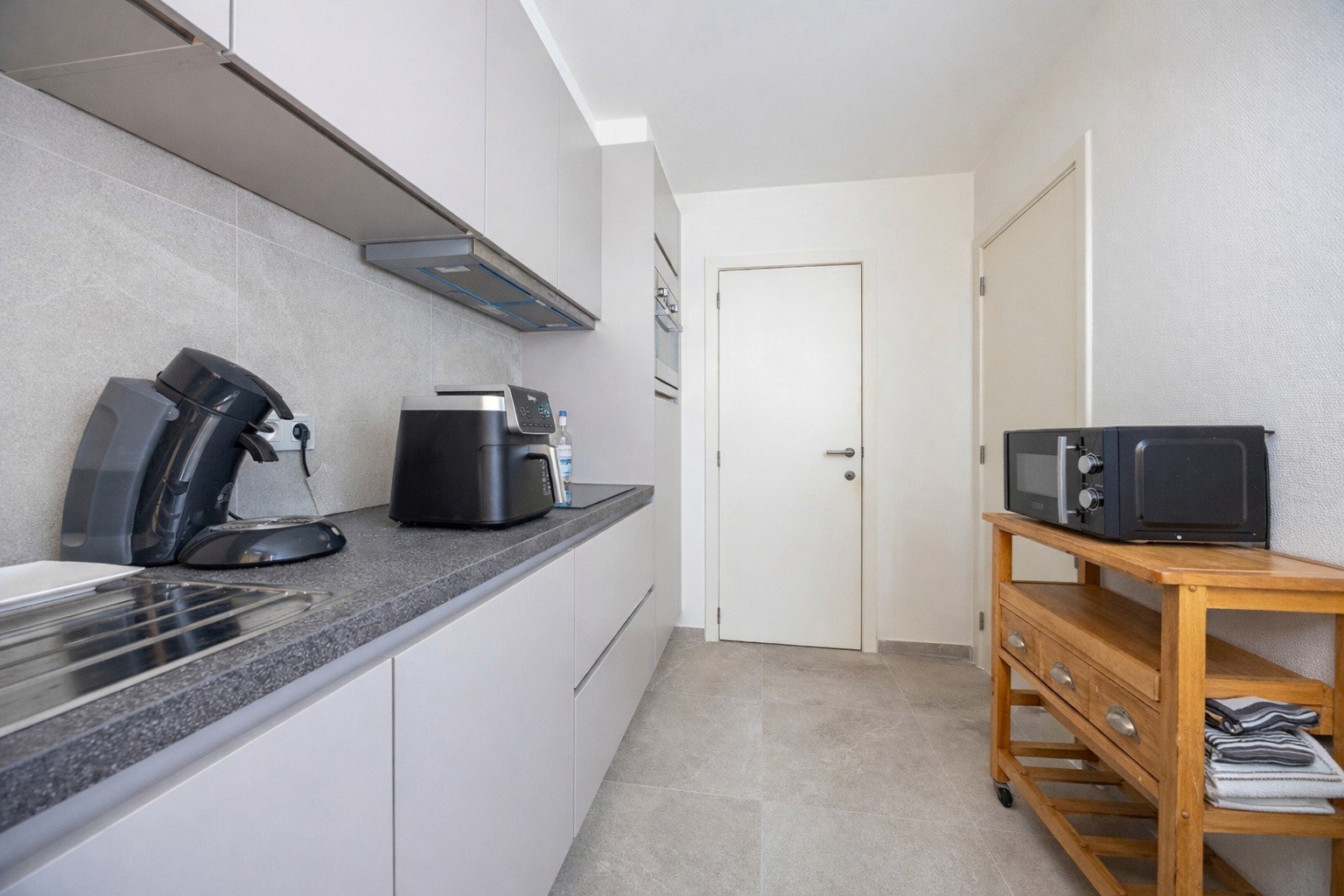 Instapklaar 2-slaapkamer appartement met 2 terrassen en garagebox! - foto 2