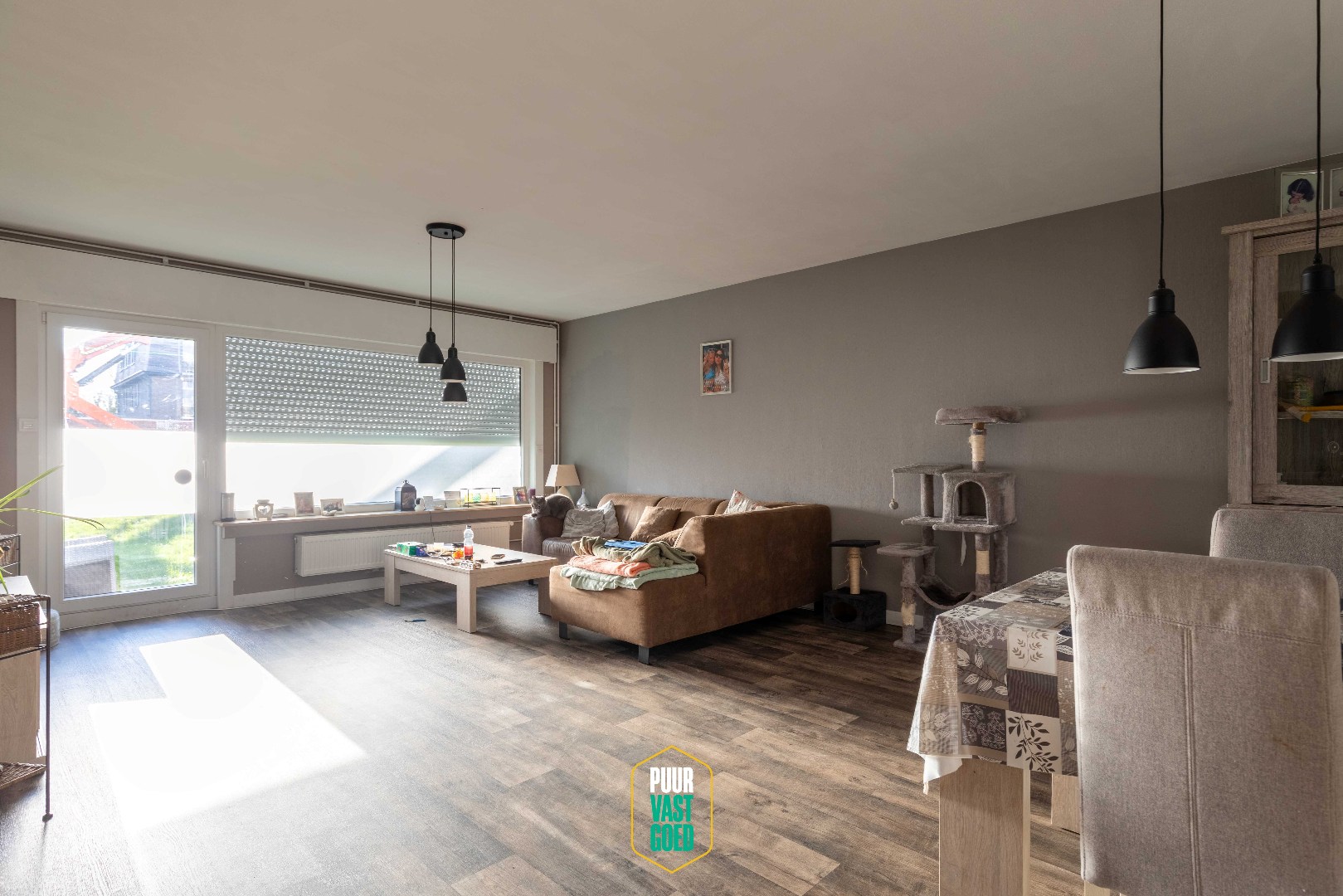 Ruim en verzorgd gelijkvloers appartement met terras en garage - foto 3