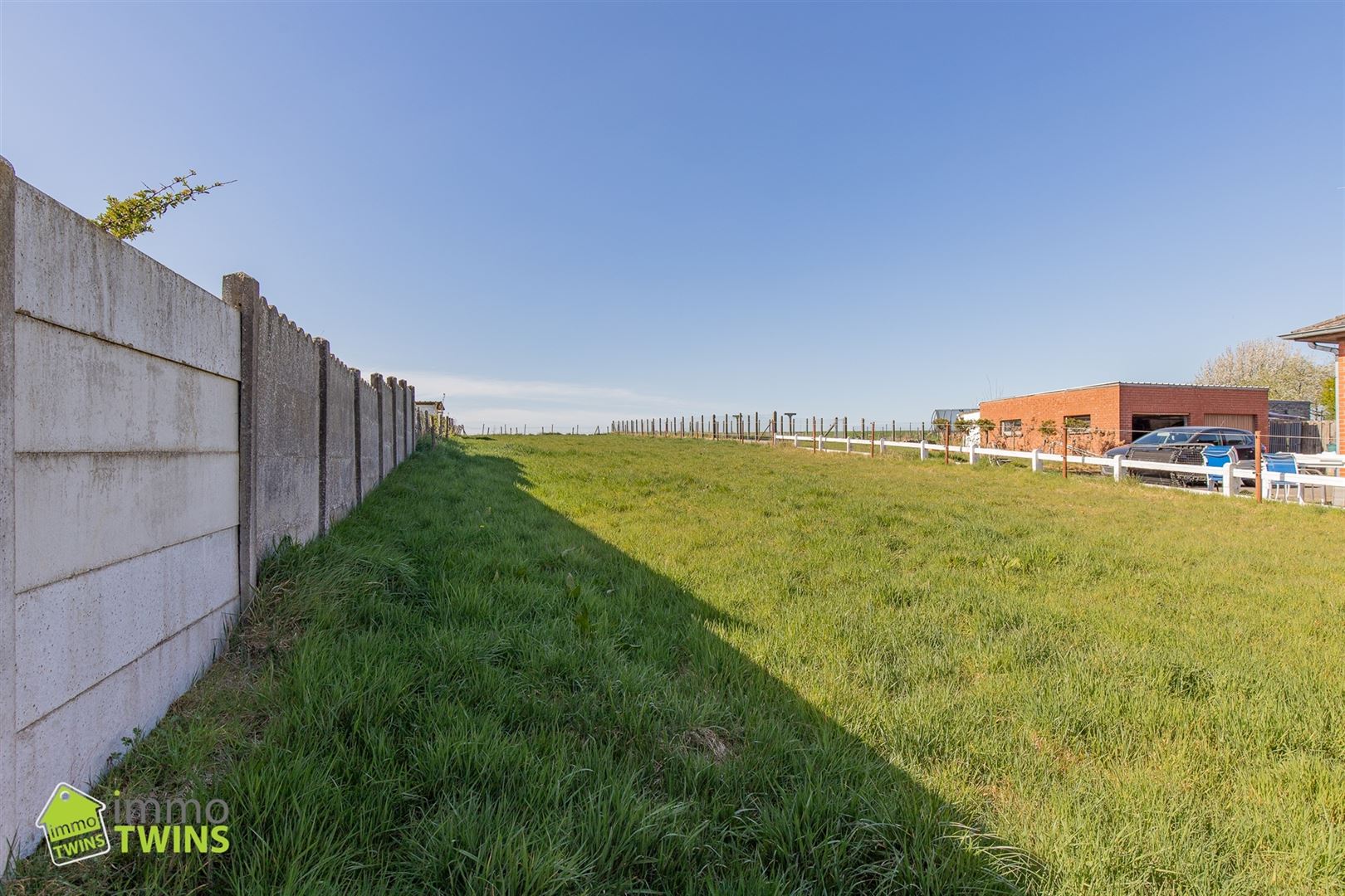 Bouwgrond halfopen bebouwing met weids groenzicht te Ninove - foto 4
