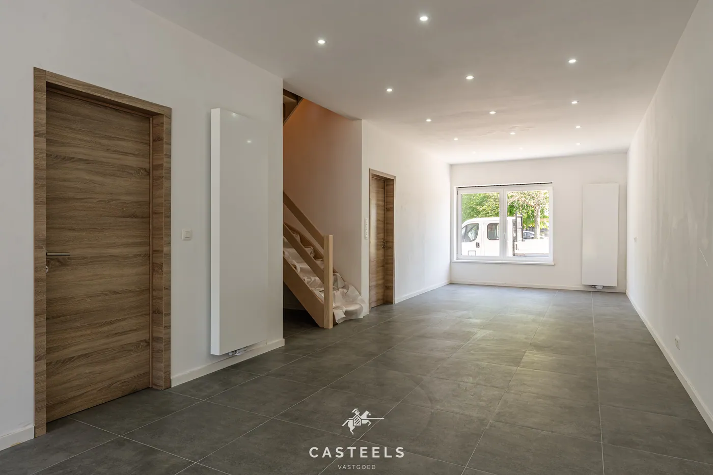 Ruime en instapklare nieuwbouwwoning met zonnige tuin nabij het centrum van Zelzate te koop - foto 4